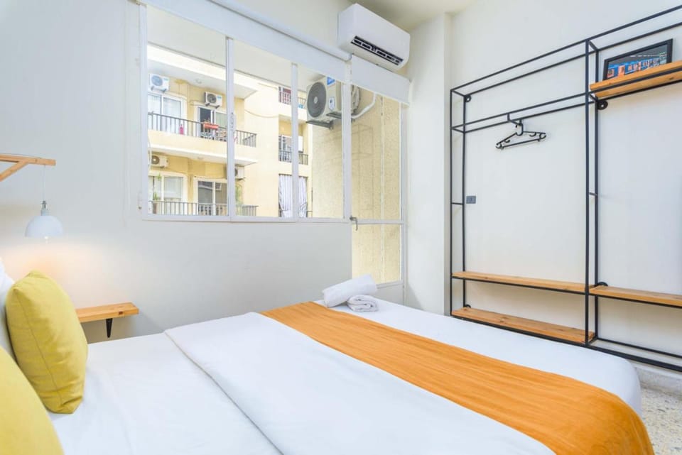 Bed, View (from property/room), towels, wardrobe, air conditioner