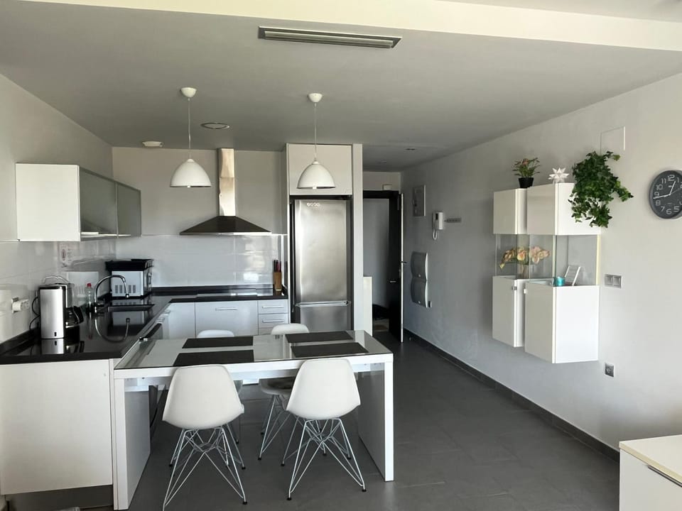 Kitchen or kitchenette, Dining area, dishwasher, stove, toaster