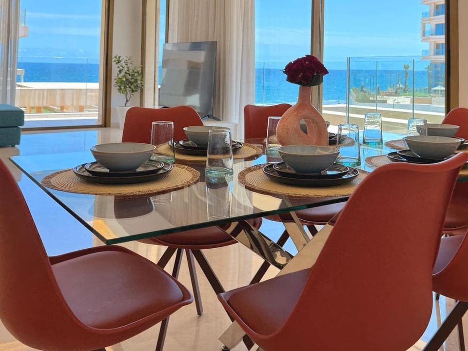Natural landscape, Living room, Seating area, Dining area, Food, Sea view