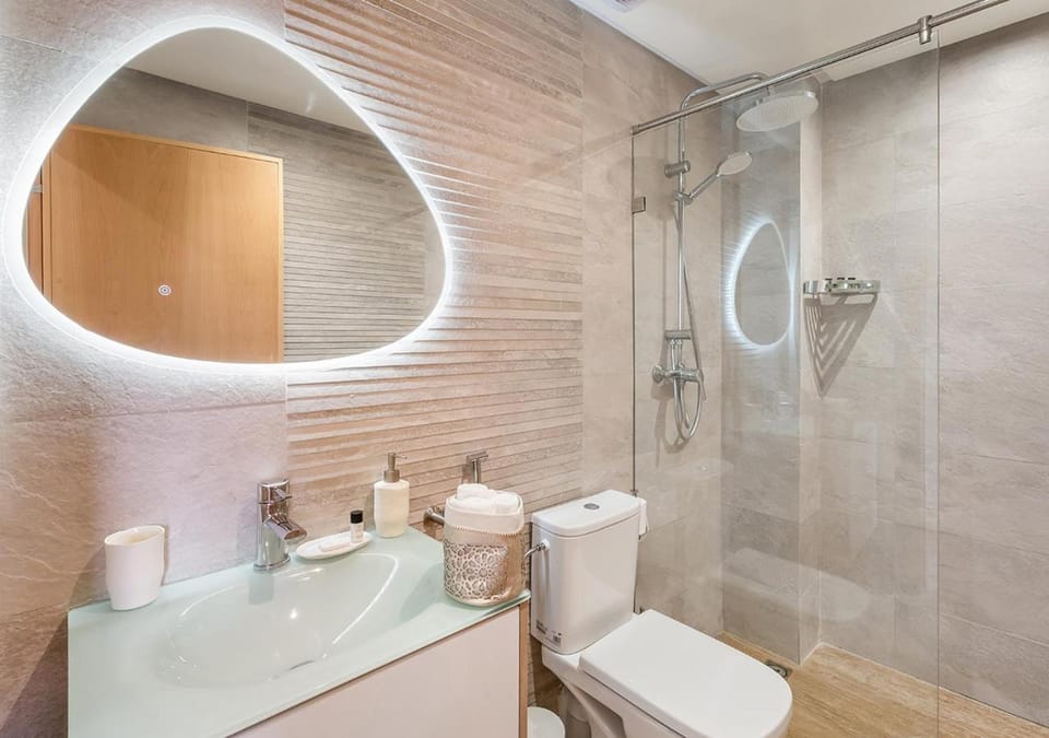 Shower, Bathroom, hair dryier, towels