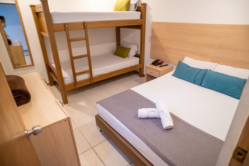 Bed, Photo of the whole room, Bedroom, bunk bed, towels, wardrobe
