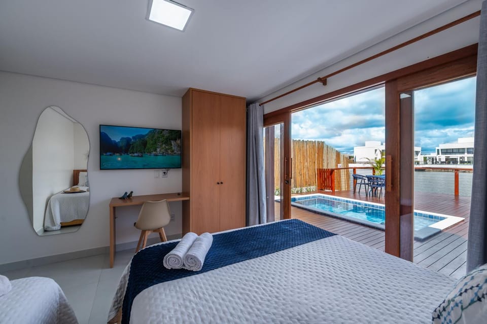 Bed, Natural landscape, View (from property/room), Photo of the whole room, Bedroom, Pool view, Swimming pool, sunbed, towels