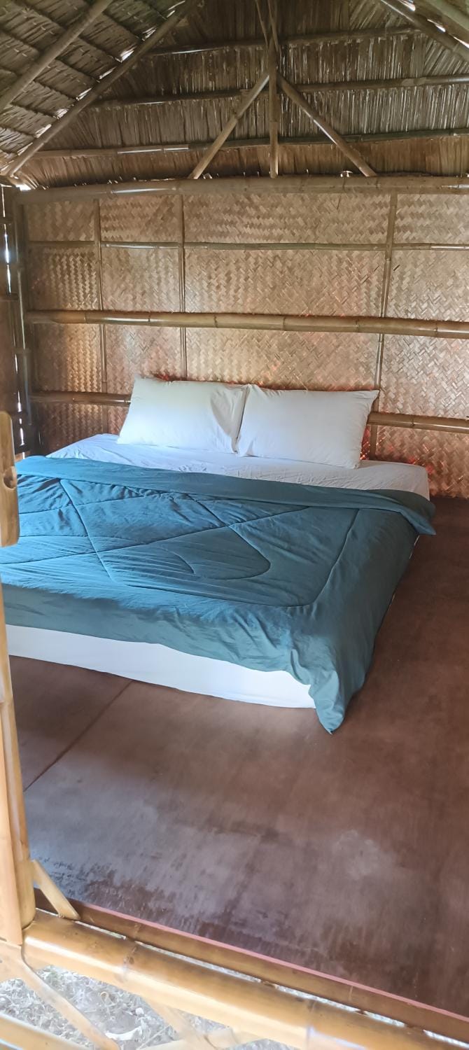 in the palm hut Campground/ 
RV Resort in Sala Dan