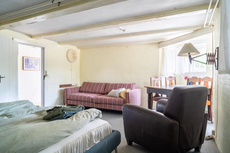 Bed, Living room, Seating area, Bedroom
