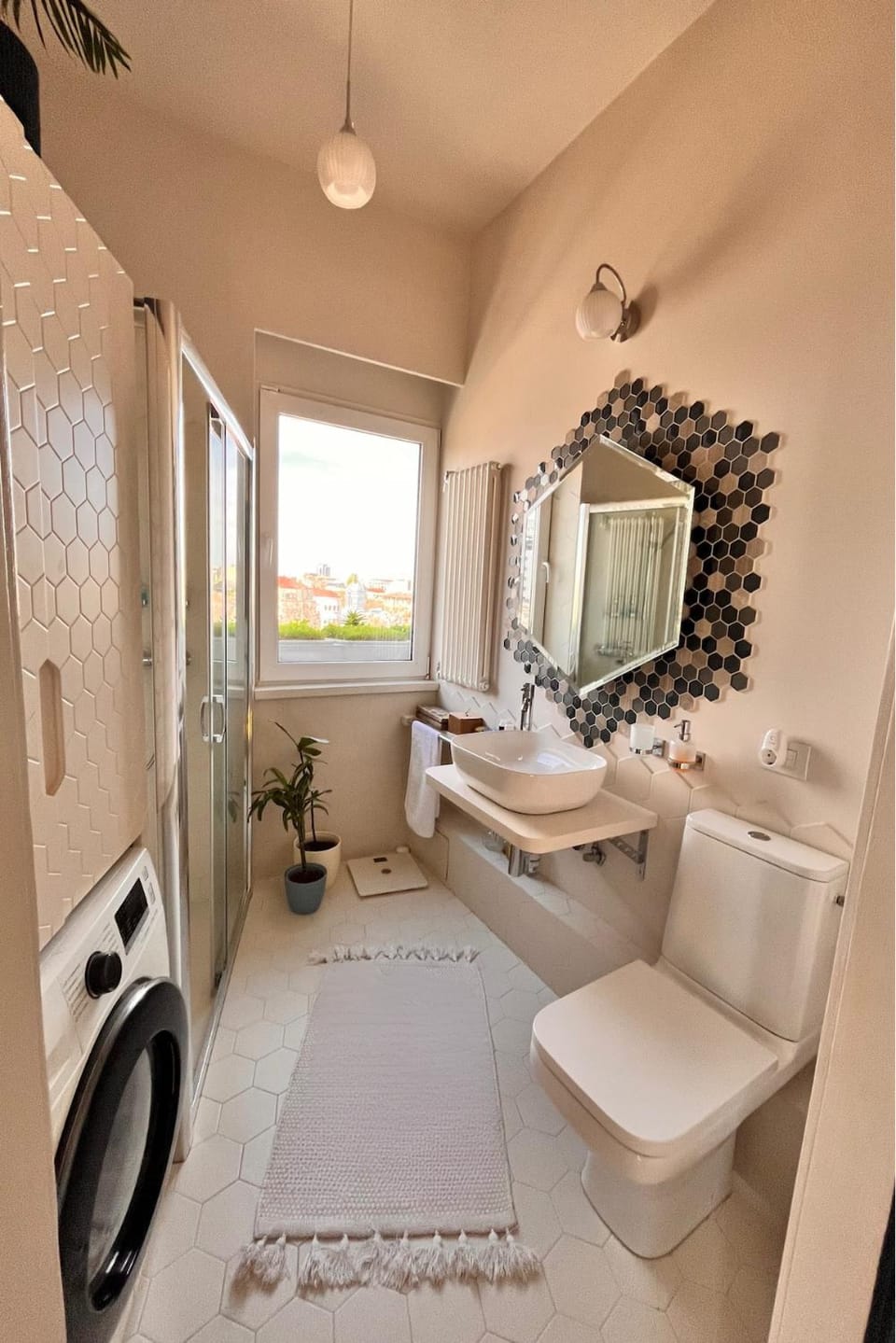 Shower, Toilet, Bathroom, bidet, towels, washing machine, dryer