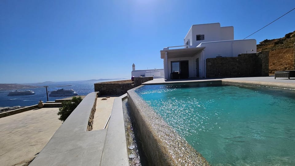 Property building, Day, Pool view, sunbed