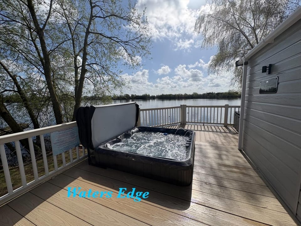 Patio, Day, Natural landscape, Hot Tub, Balcony/Terrace, Lake view