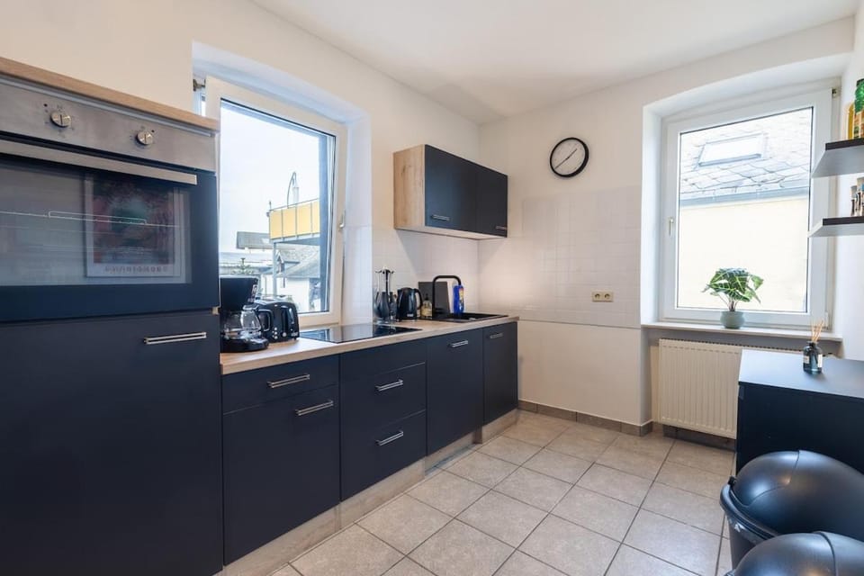 Kitchen or kitchenette, dishwasher, oven, stove, toaster