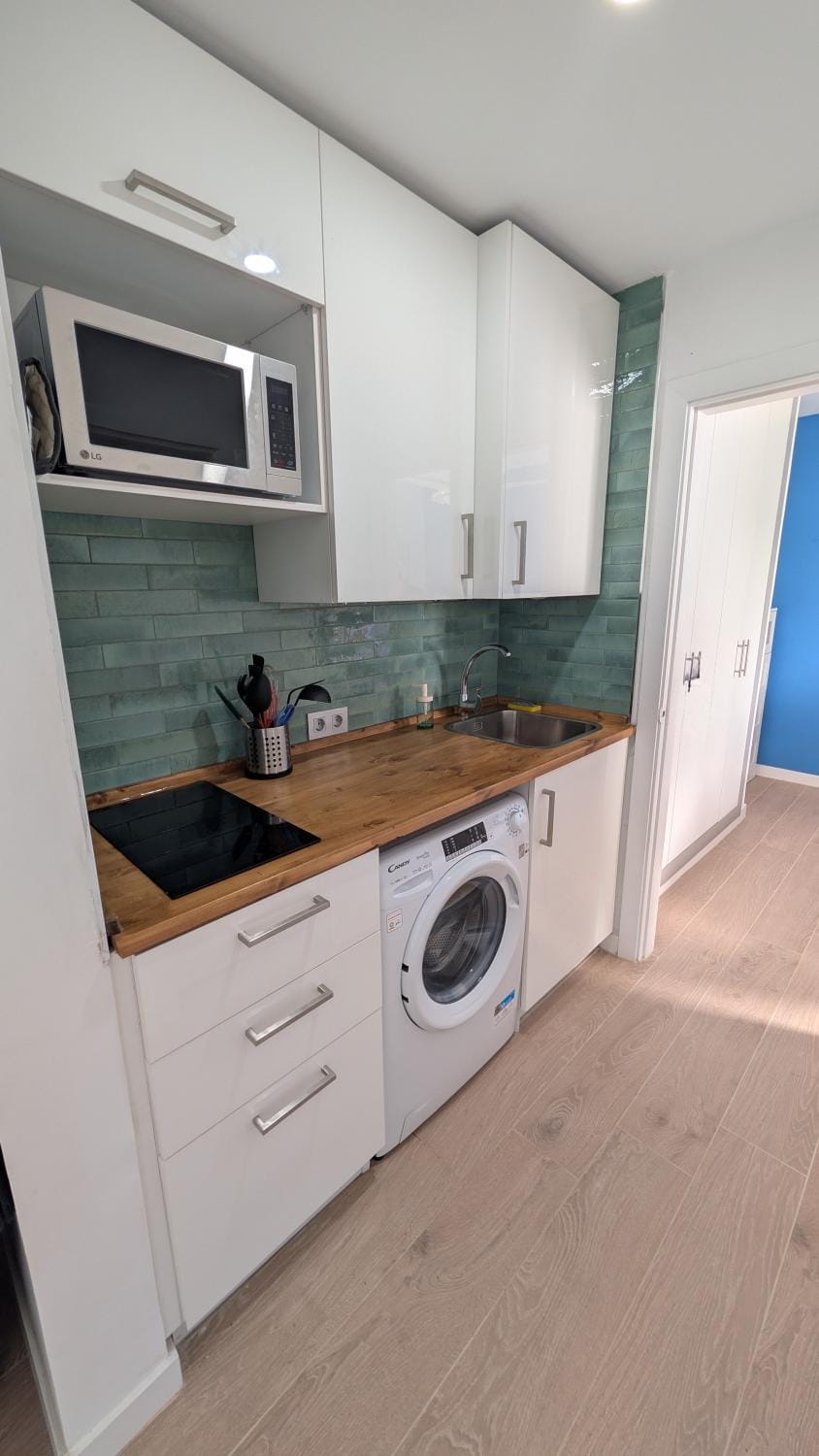 microwave, stove, washing machine, kitchen