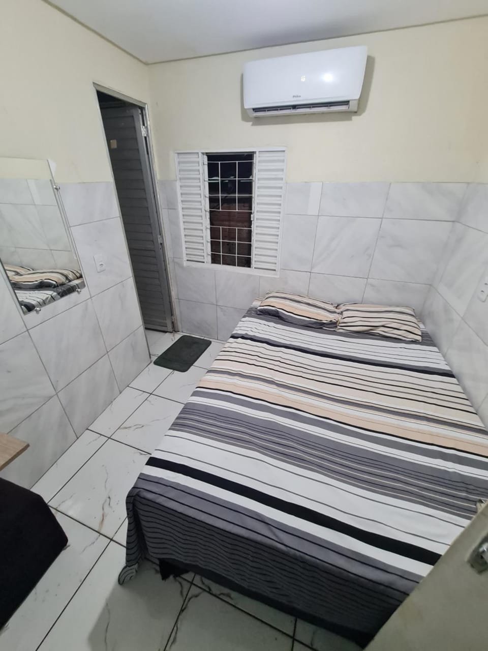 Photo of the whole room, air conditioner