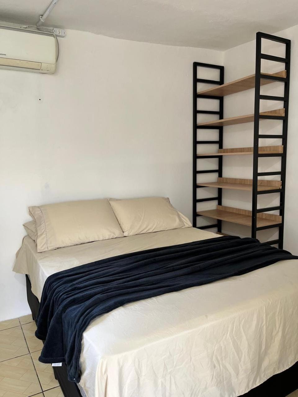 Bed, air conditioner