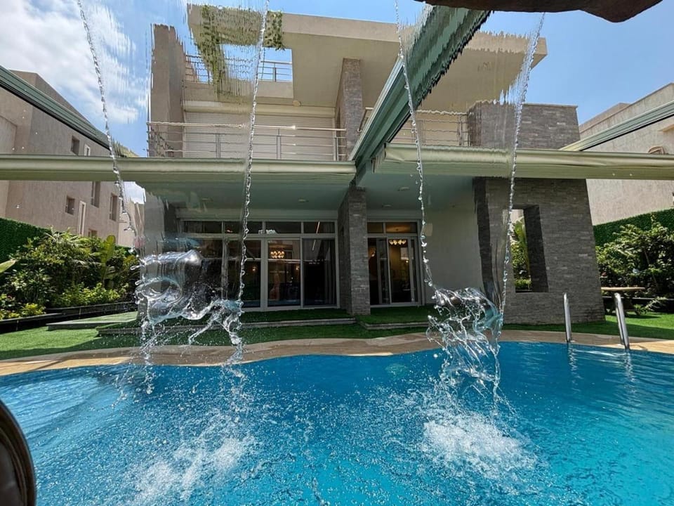 Property building, Patio, Day, Garden, Pool view, Swimming pool, Swimming pool