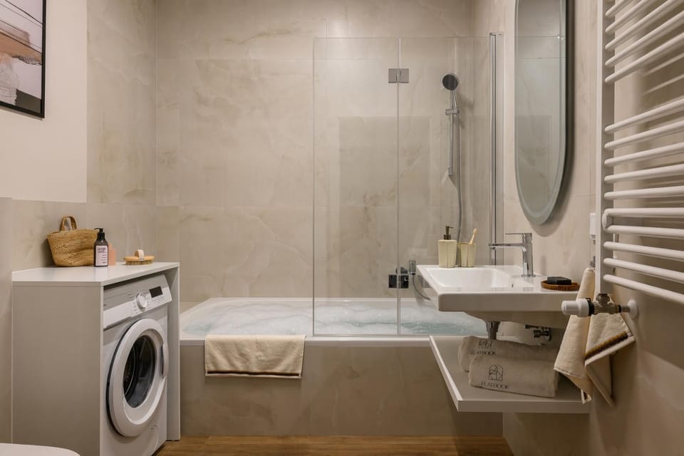 Shower, Toilet, Bath, towels, washing machine