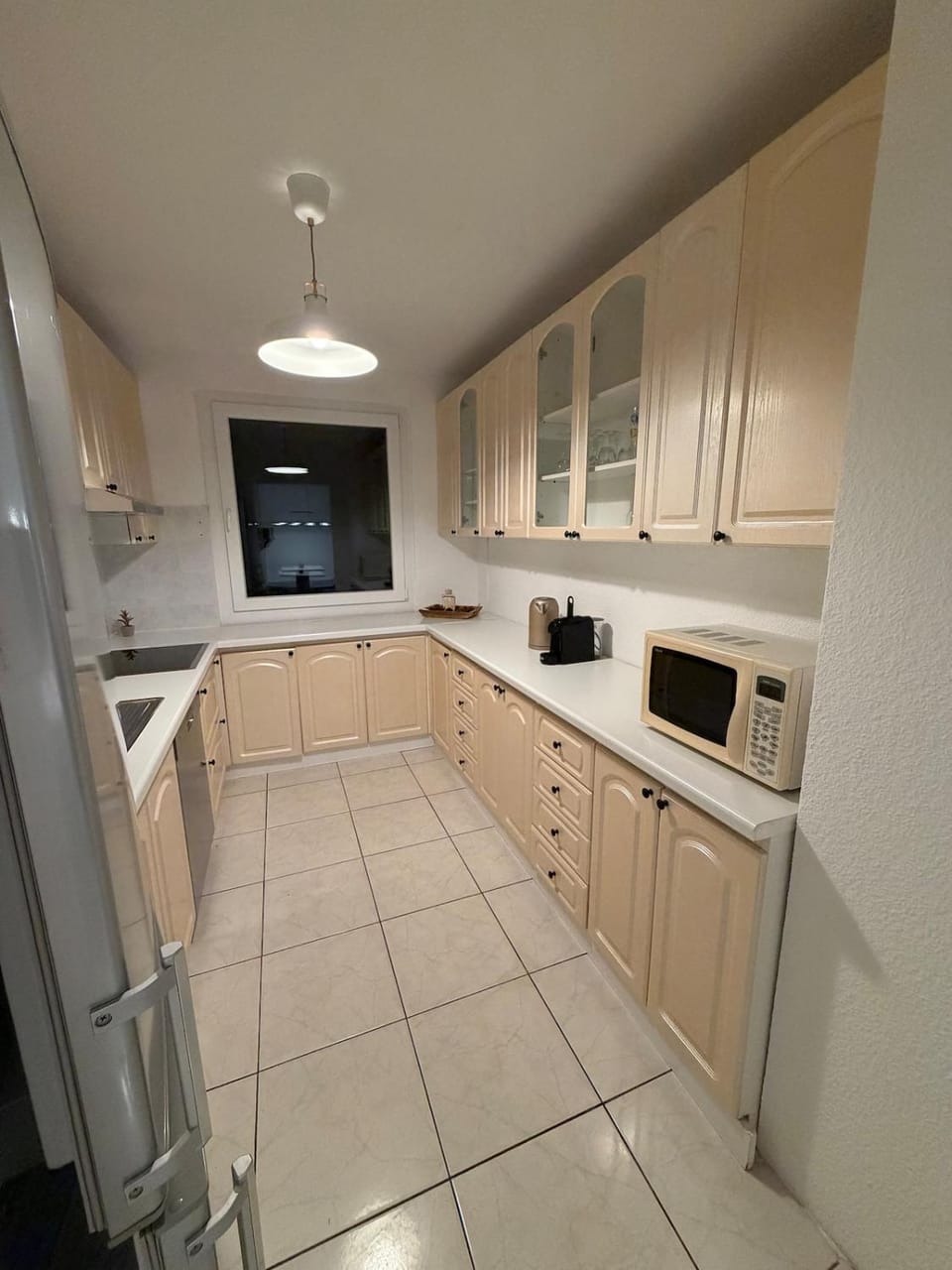Kitchen or kitchenette, dishwasher, stove, toaster