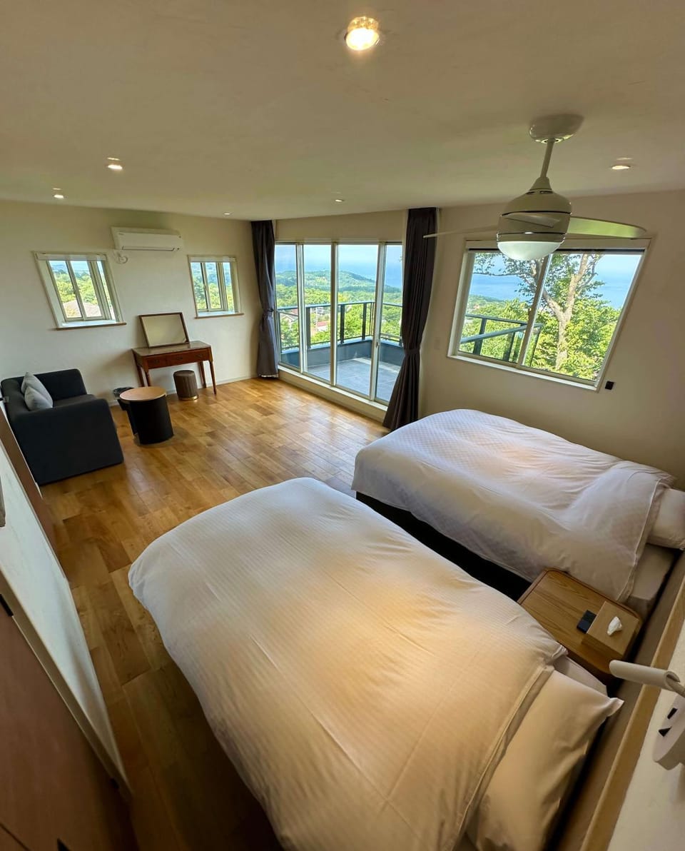Bed, View (from property/room), Balcony/Terrace, Photo of the whole room, Seating area, Bedroom, Garden view, Mountain view, Sea view, furniture, air conditioner