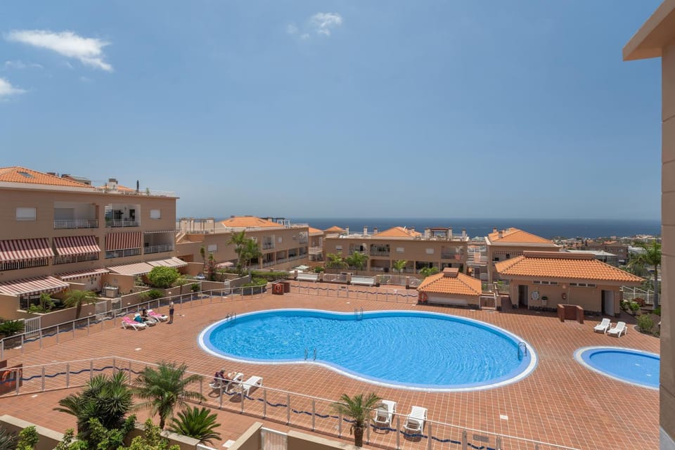 Property building, Living room, Swimming pool