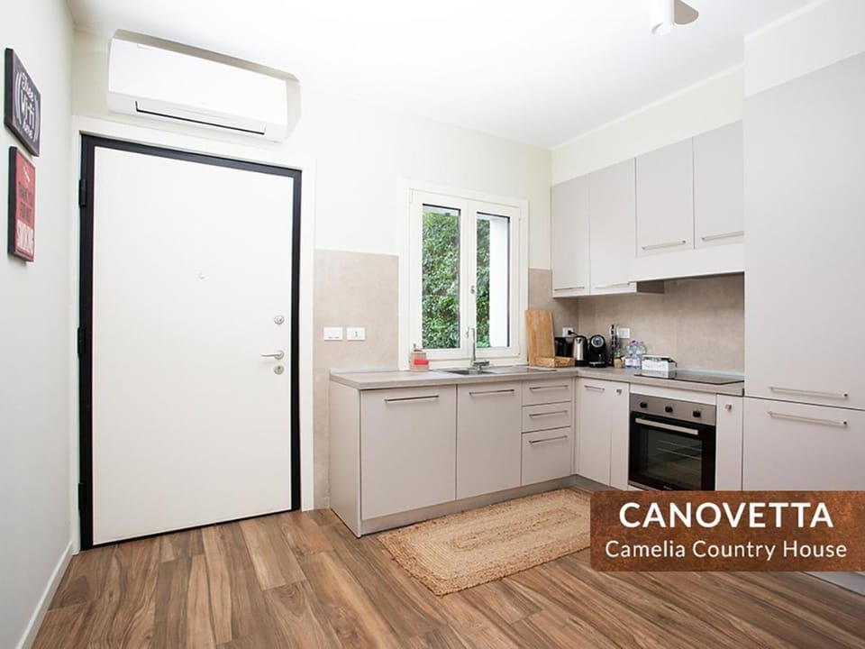 Kitchen or kitchenette, dishwasher, oven, stove, toaster, kitchen