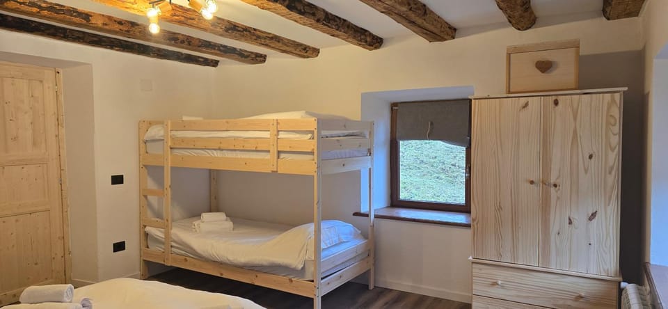 Photo of the whole room, bunk bed, wardrobe