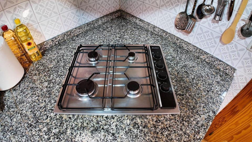 Kitchen or kitchenette, stove