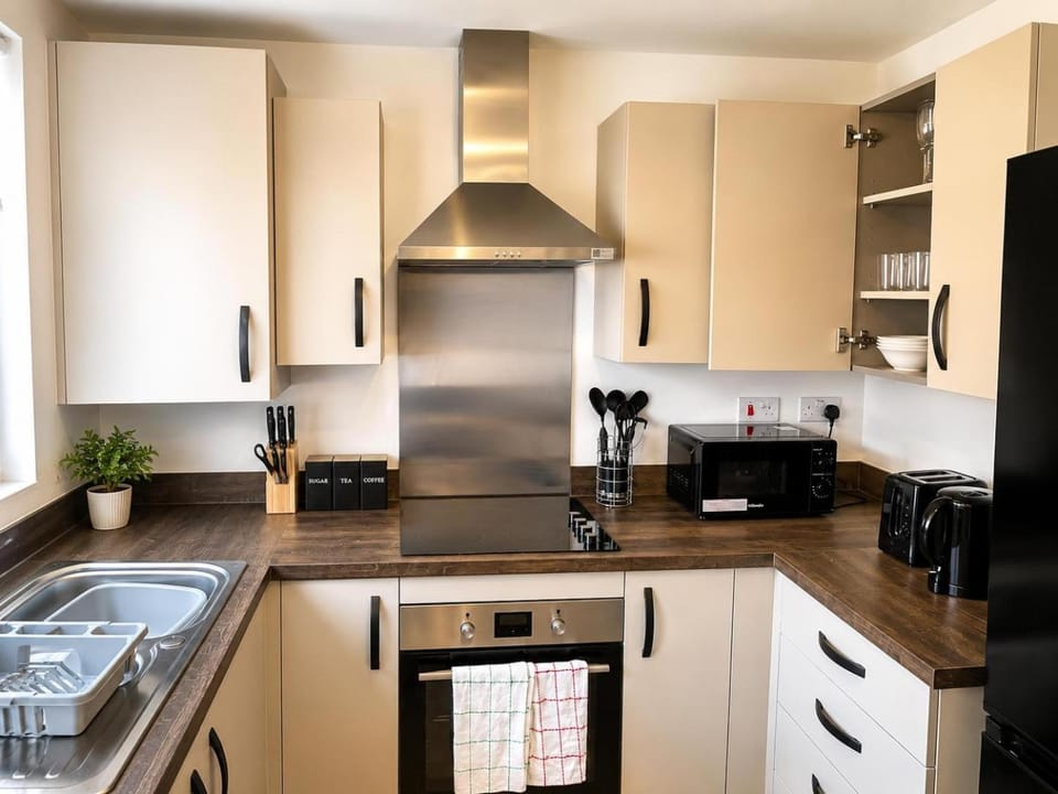 Kitchen or kitchenette, oven
