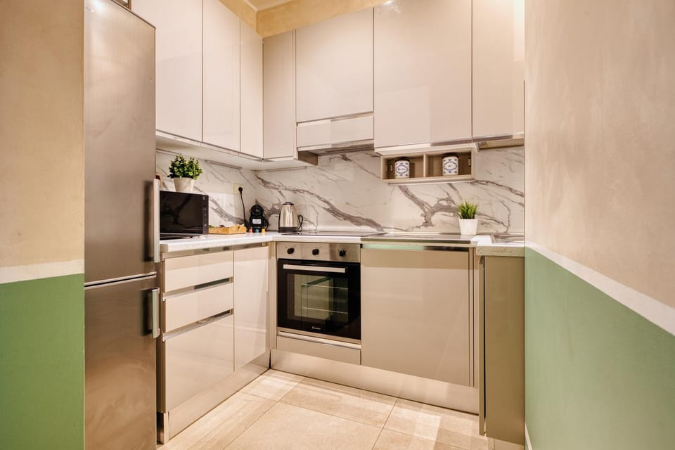 Kitchen or kitchenette, dishwasher, microwave, oven, stove, kitchen