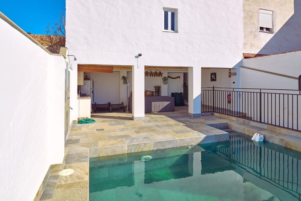 Property building, Living room, Swimming pool