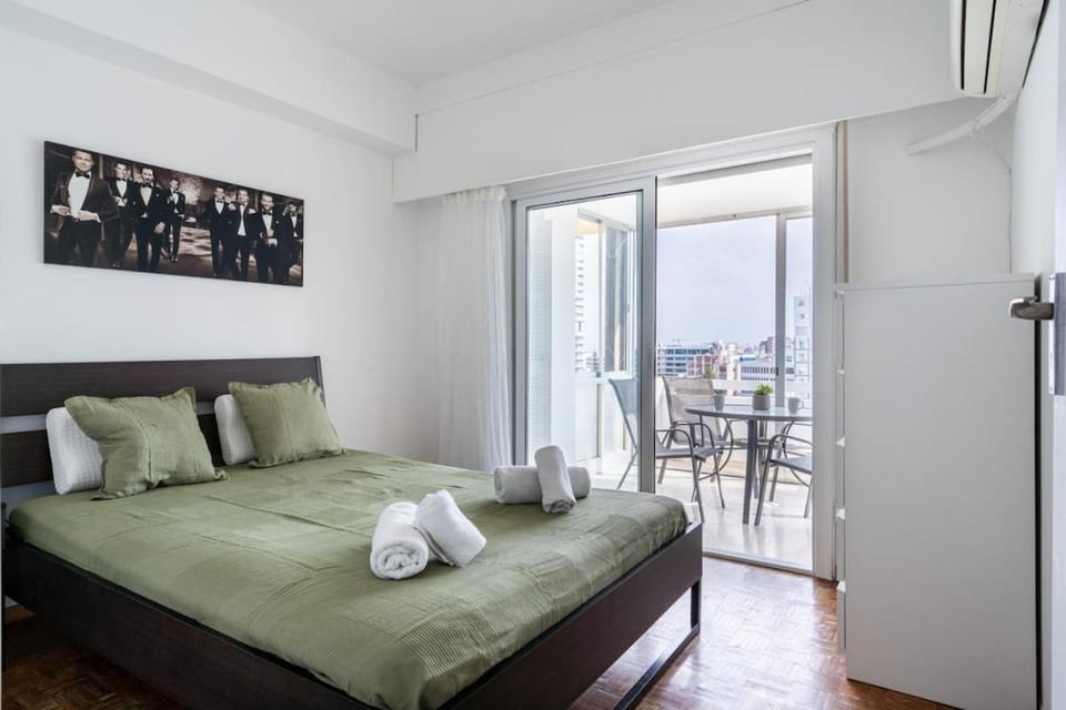 Bed, View (from property/room), Balcony/Terrace, Bedroom, towels, wardrobe, air conditioner