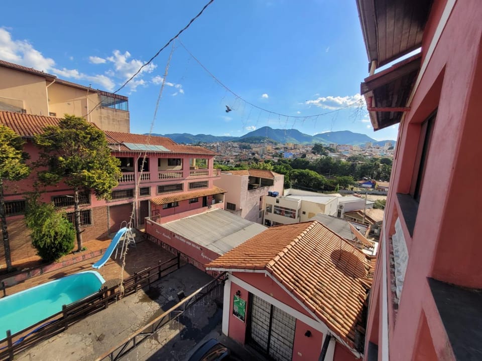 Property building, Day, Natural landscape, City view, Mountain view, Pool view, Swimming pool