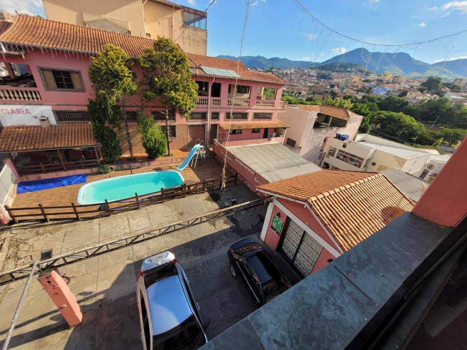 Property building, Day, Natural landscape, City view, Mountain view, Pool view, Swimming pool, Parking