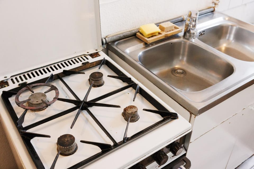 Kitchen or kitchenette, stove