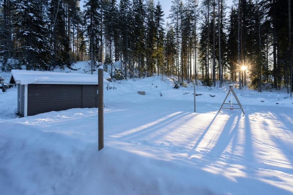 Lovely 10-person cottage with a lakeside sauna and hot tub Villa in Finland