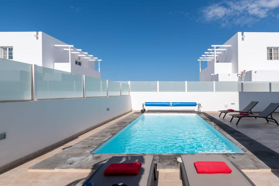Property building, Living room, Swimming pool