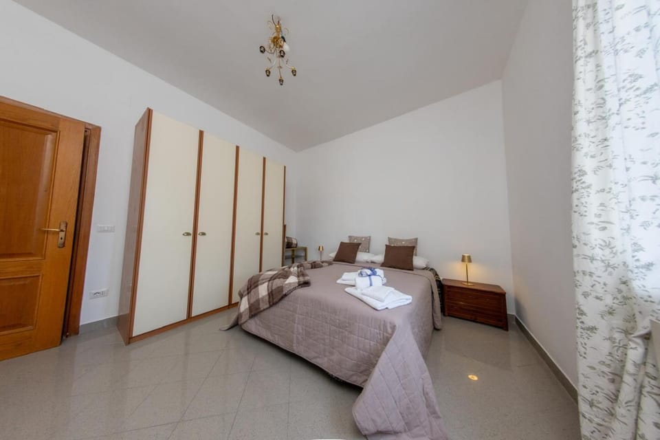 Bed, Photo of the whole room, Bedroom, towels, wardrobe
