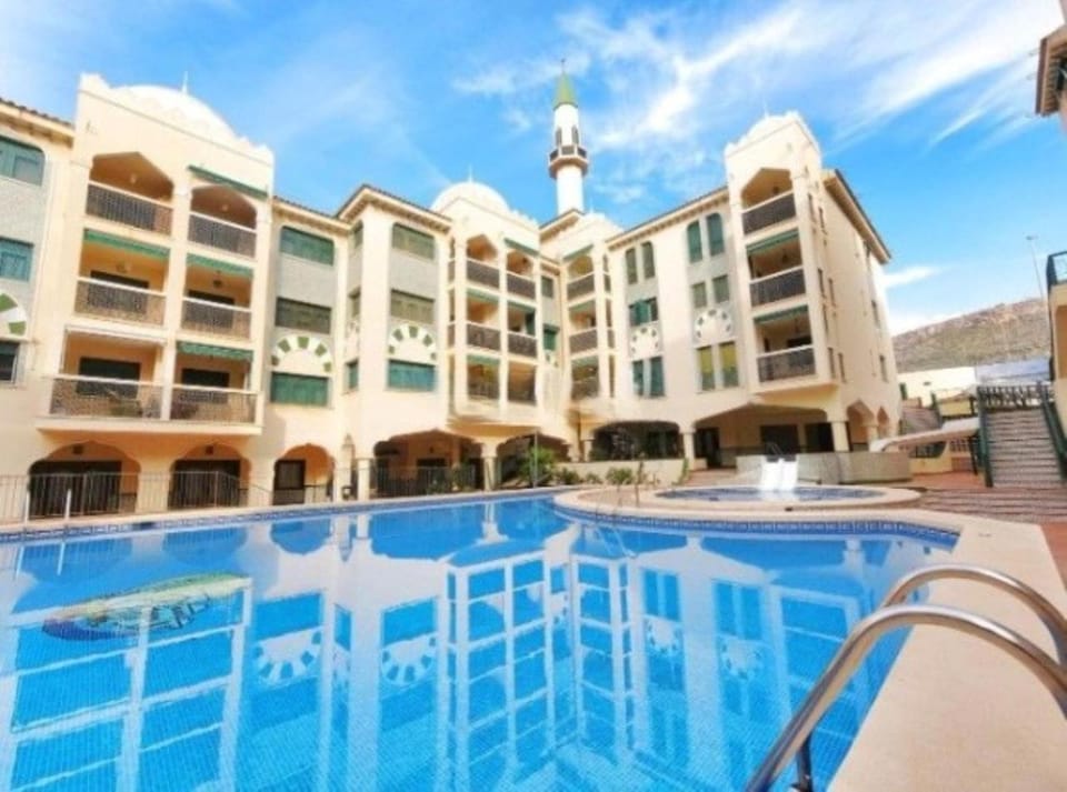Property building, Swimming pool, sunbed