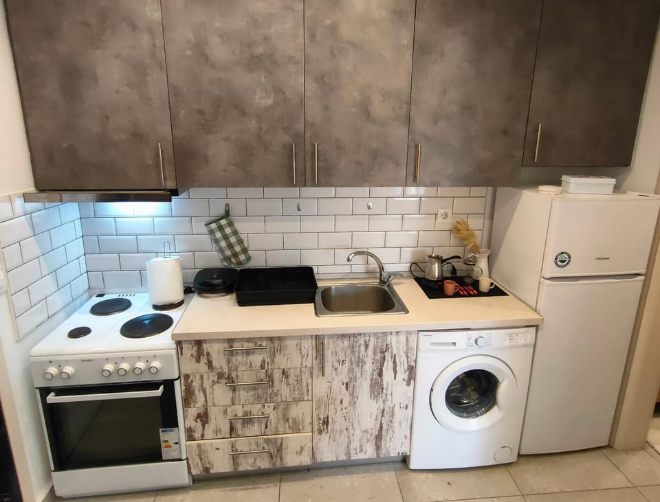 Coffee/tea facilities, Kitchen or kitchenette, oven, stove, washing machine