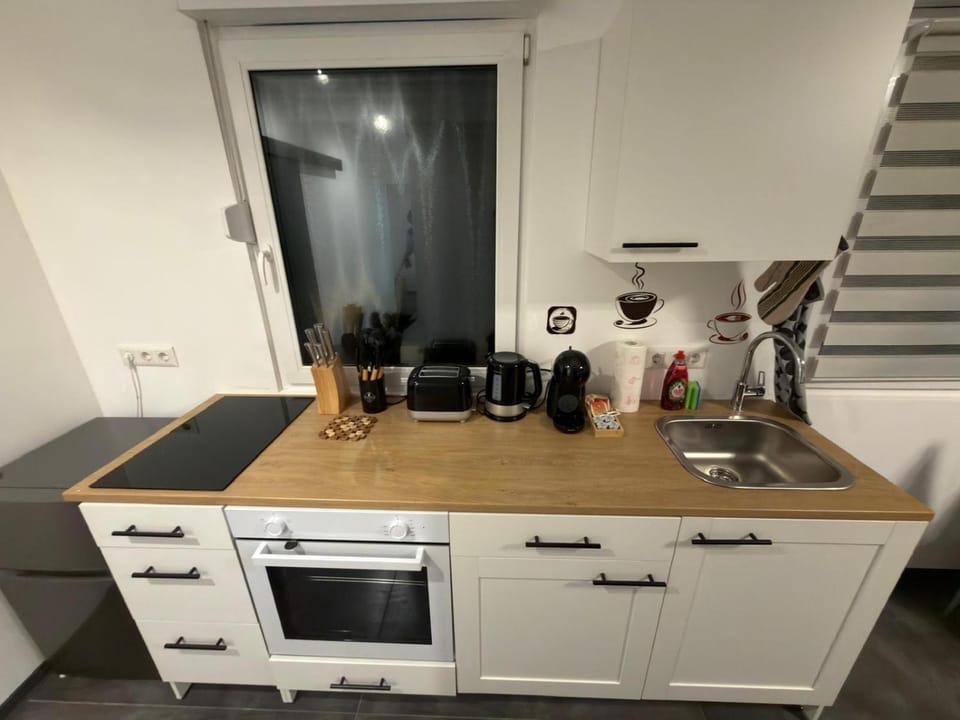 Kitchen or kitchenette, stove