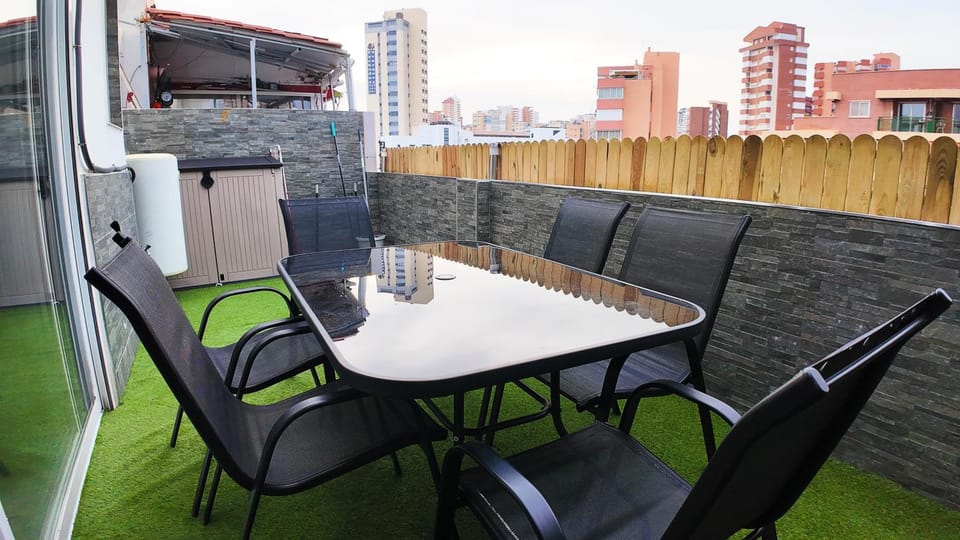 Property building, Patio, Day, View (from property/room), Balcony/Terrace, Living room, Seating area, Dining area, Evening entertainment