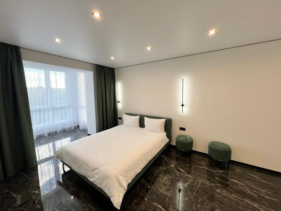 Сучасні апартаменти в новому ЖК Great House,район автовокзалу,центр,поруч обласна лікарня,парковка,автономне опалення,два окремі місця Apartment in Ukraine