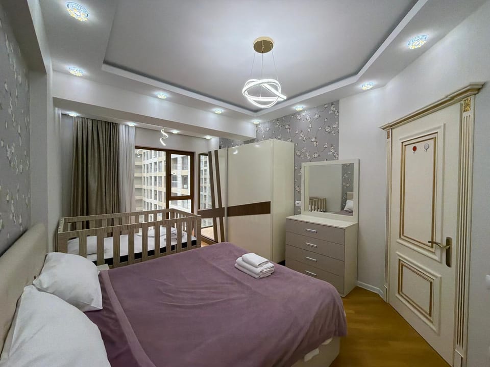 Bed, Bedroom, hair dresser, towels, wardrobe
