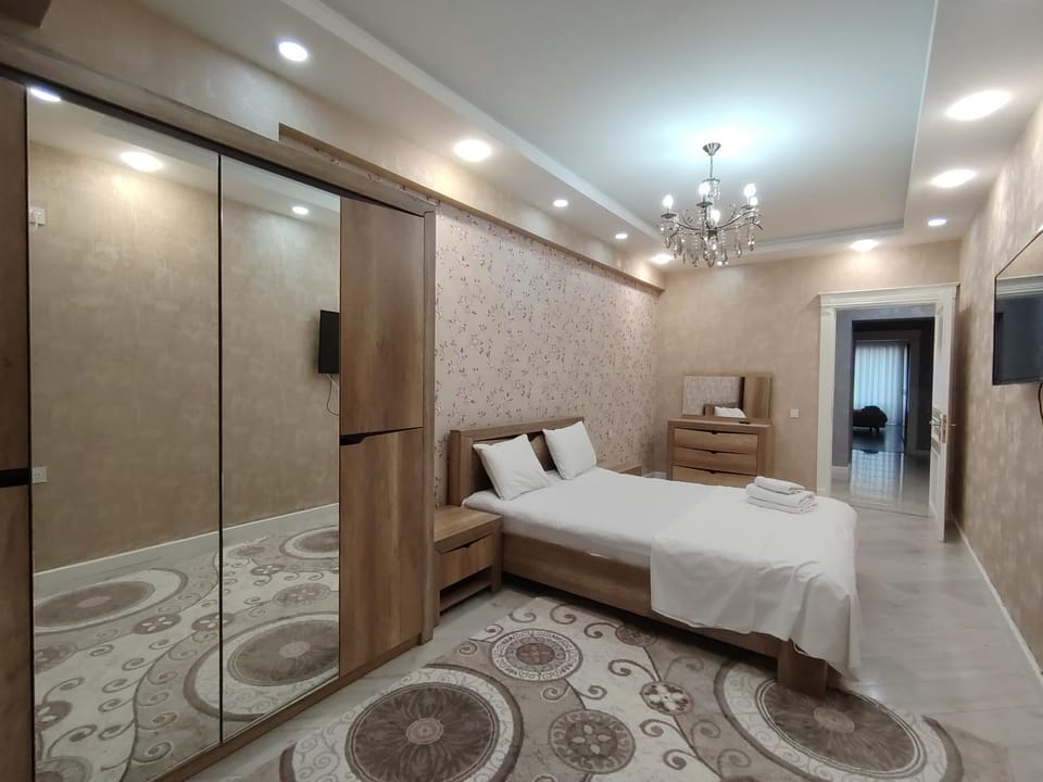 Bed, TV and multimedia, Bedroom, towels, wardrobe