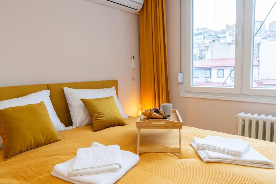 Bed, Bedroom, City view, towels, air conditioner