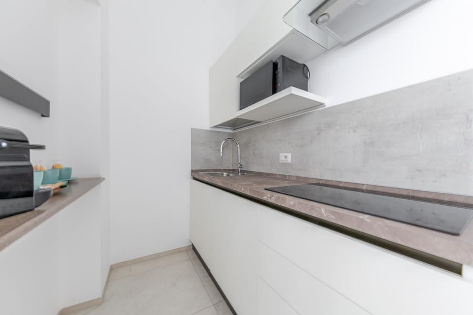 Kitchen or kitchenette, stove