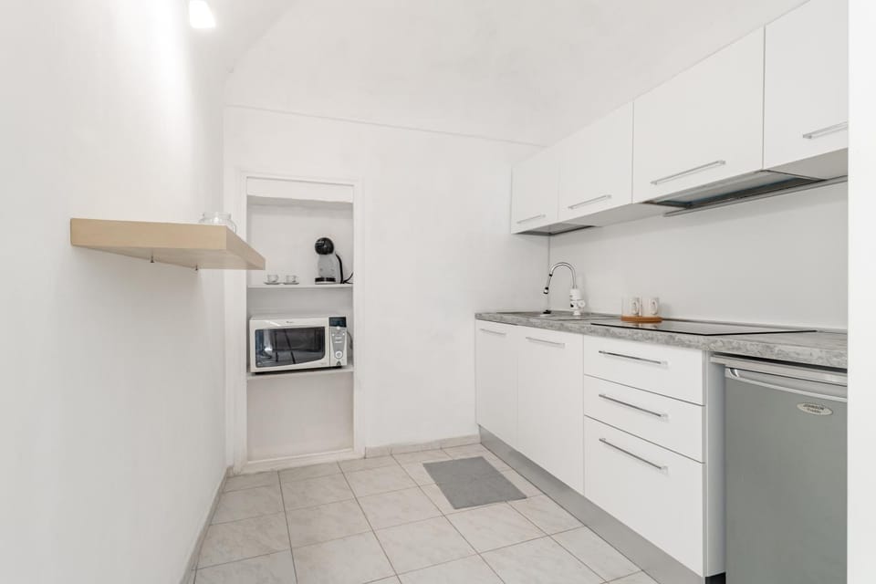 Kitchen or kitchenette, microwave, stove, kitchen