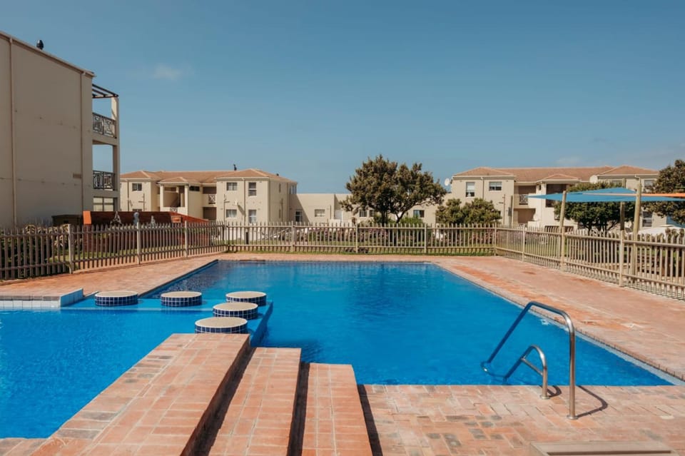 Property building, Pool view, Swimming pool, sunbed