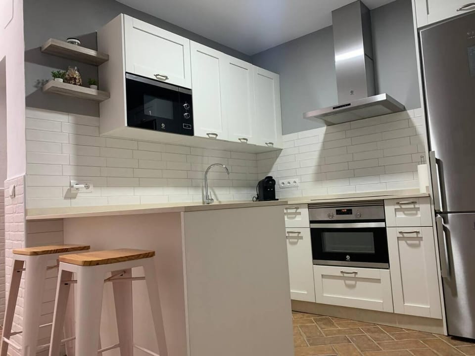 Kitchen or kitchenette, oven, stove