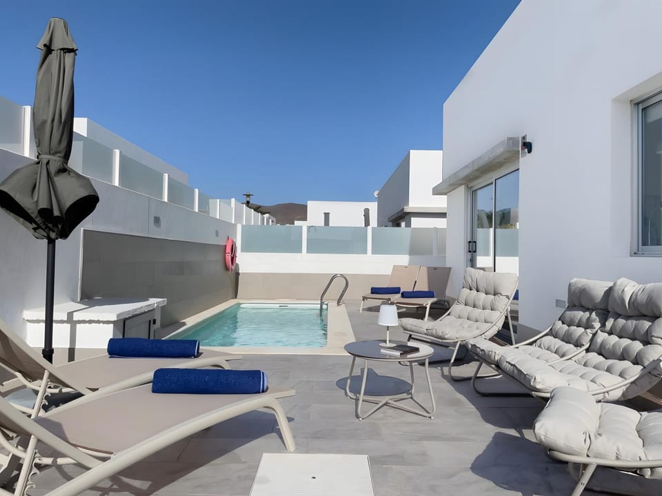 Property building, Living room, Swimming pool