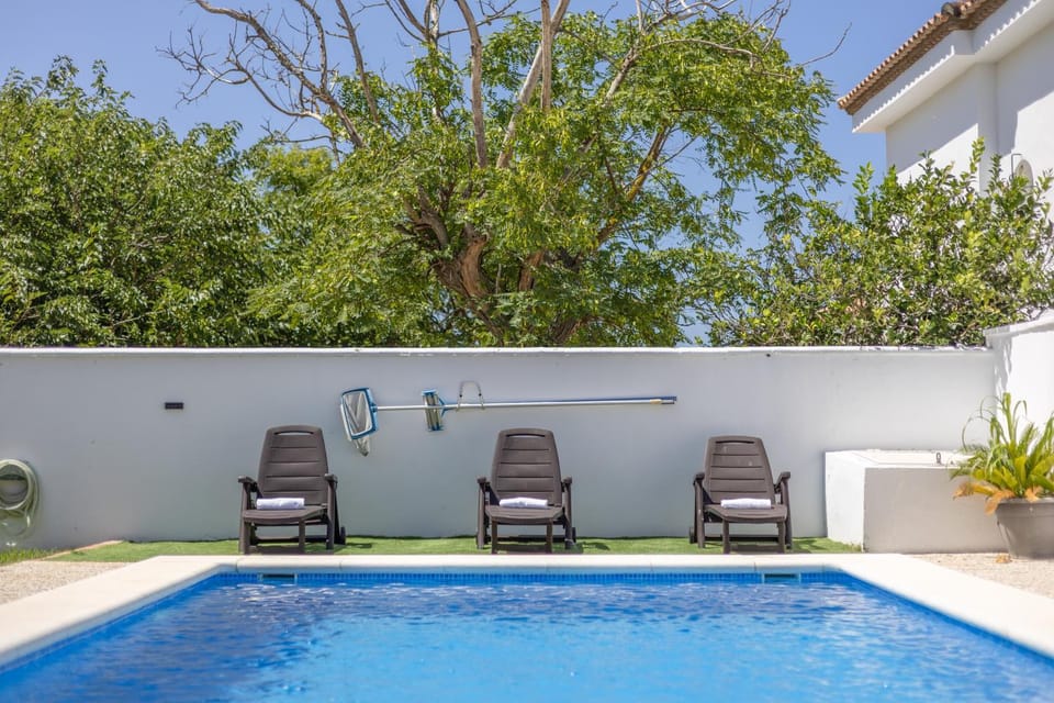 Property building, Living room, Swimming pool