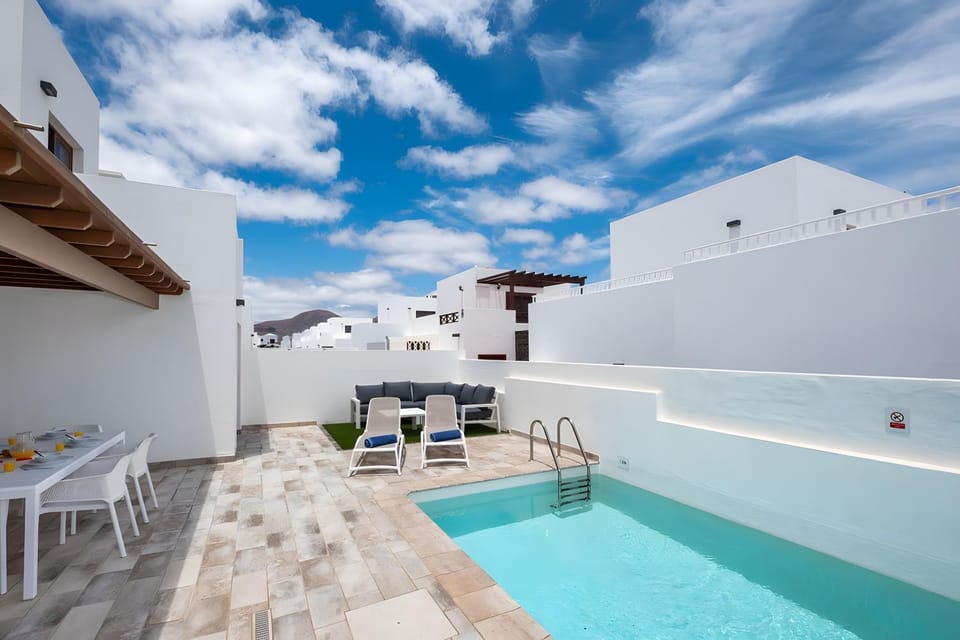 Property building, Living room, Swimming pool