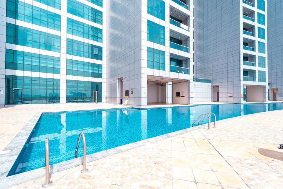 Sand And Beachfront Havens with sea view&pool&Gym&jacuzz Apartment in Ajman