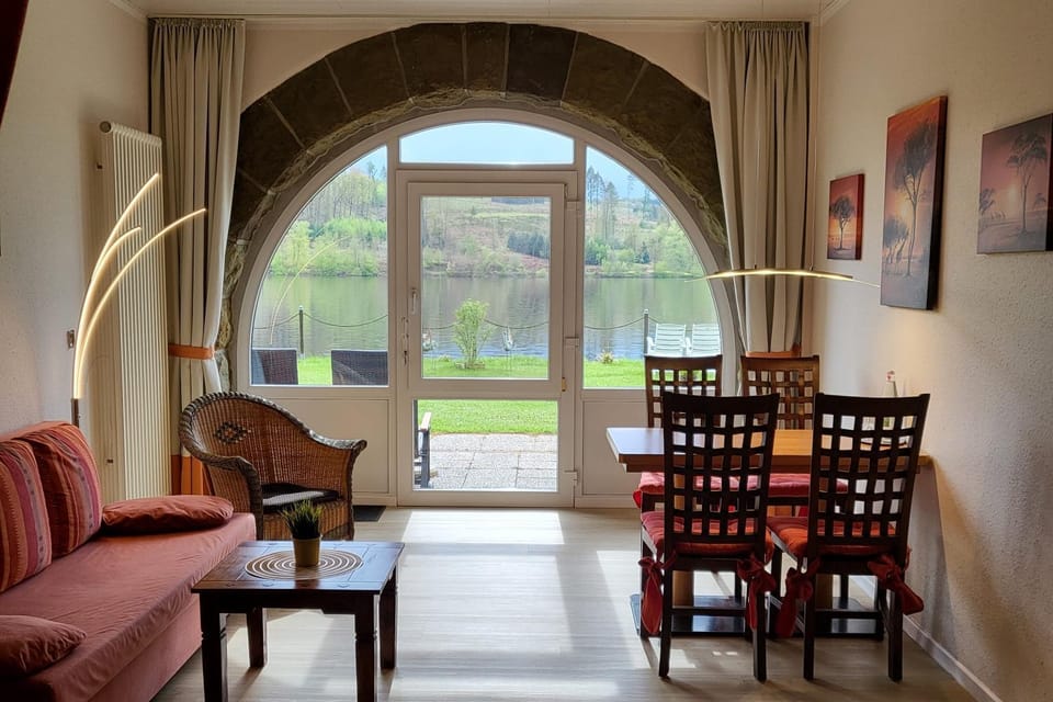 View (from property/room), View (from property/room), Living room, Seating area, Dining area, Lake view, Lake view